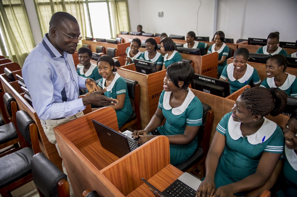 IT tutor instructing students on the use of eLearning at Hohoe Midwifery Training School in Ghana