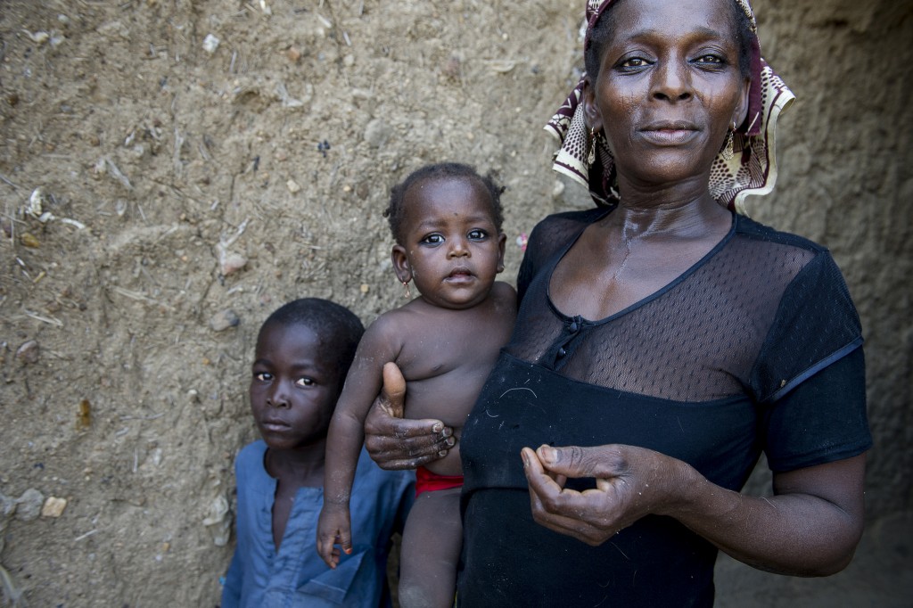 In Nigeria, a mother of seven with two of her children.