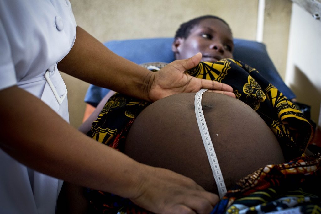 Pregnant woman in Tanzania being examined