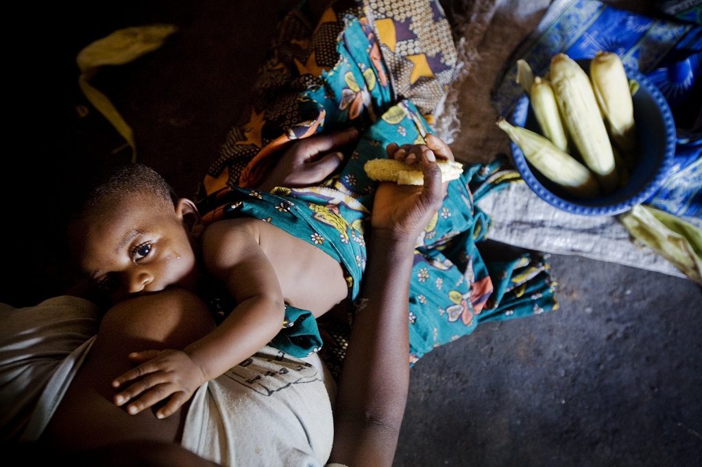 Mother in Tanzania breastfeeding her child