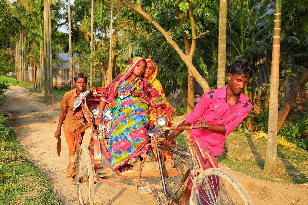 An expectant mother from a remote village in Bangladesh travels to the nearest Union Health and Family Welfare Center to deliver her baby.