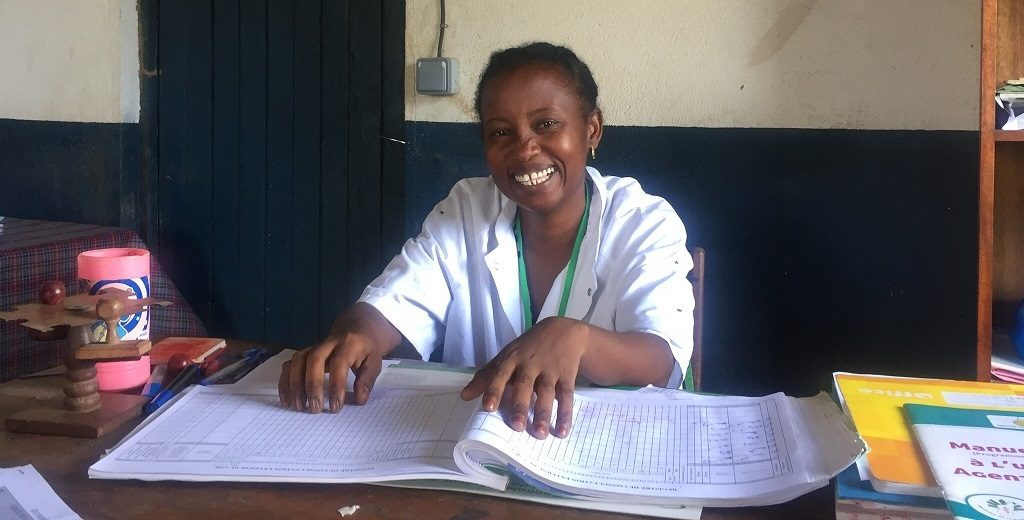 Dr. Lucie Famamesamtsoa with the immunization register