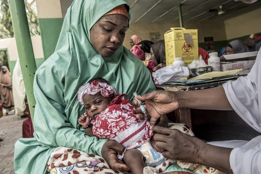 A child is vaccinated at the Women and Children Welfare Hospital in Sokoto