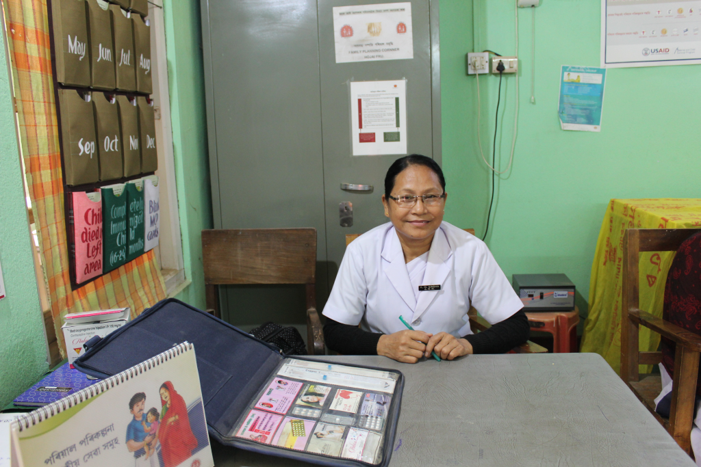 Auxiliary Nurse Midwife Kunjamani Singha, a trusted face in her community, with MCSP’s family planning flipbook and counseling kit.